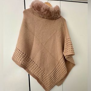 Beautiful Crochet poncho with faux  fur collar.